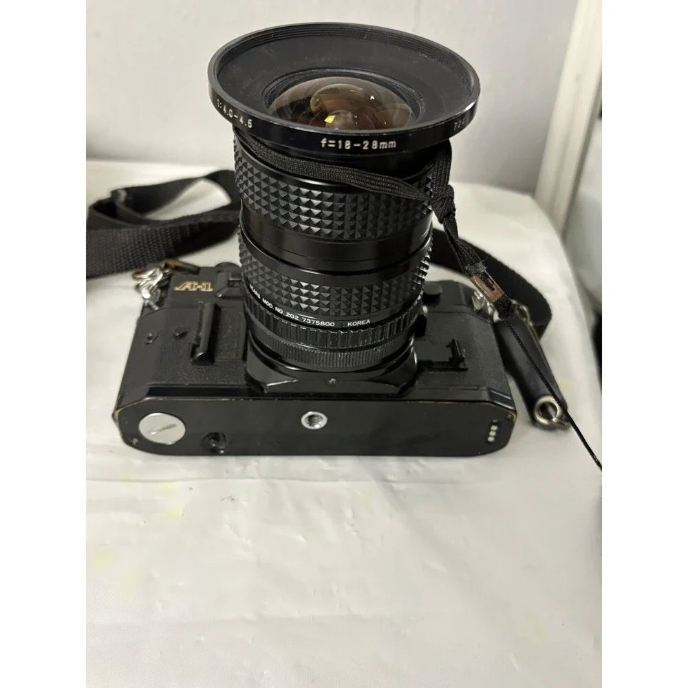 Canon A-1 35mm Film Camera with toyo optics 28mm 1:3.5 Lens and F=28-80  Tested